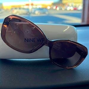 Nine West sunglasses with case. Never worn.